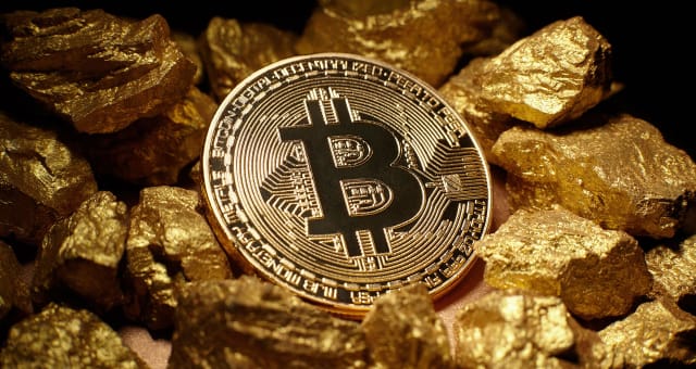 هل يمكن شراء الذهب بالعملات المشفرة؟ الدليل الشامل