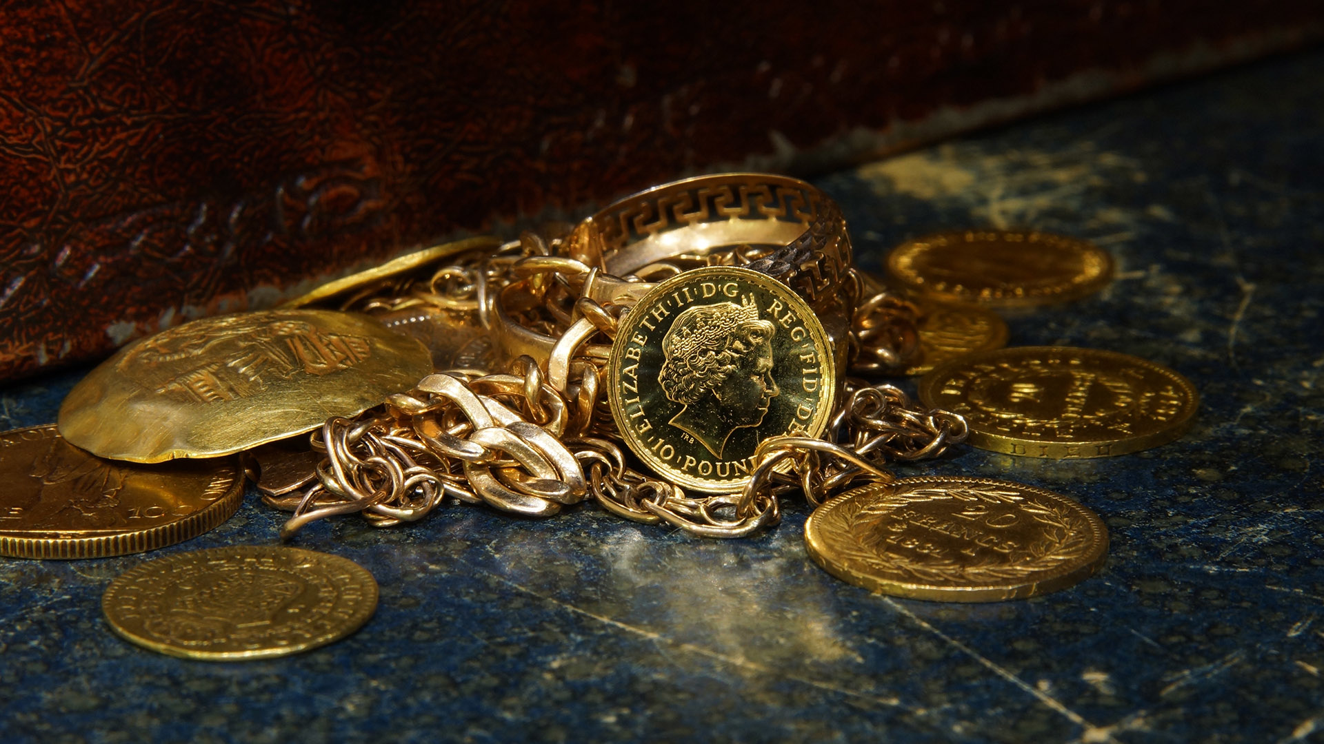 Crown Jewels to Family Heirlooms: The Fate of Queen Elizabeth II's Iconic Jewelry Collection